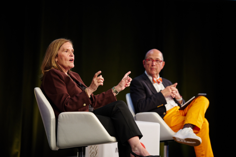 Joe Coughlin (right) during a fireside chat with Lisa Marsh Ryerson (left)